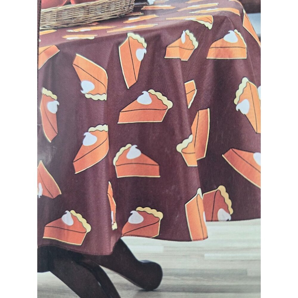 Celebrate Harvest PEVA Tablecloth 70 Inch Diameter Pumpkin Pie Print Round Table